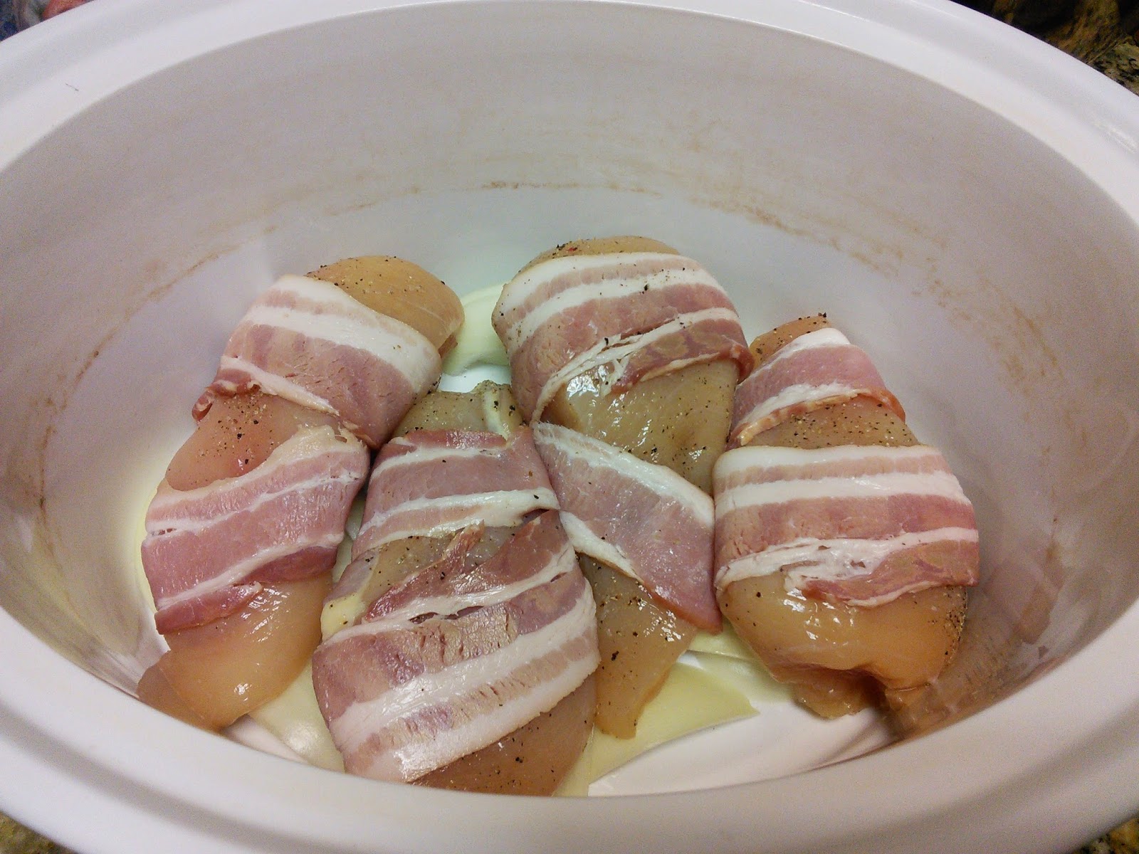 Hot Southern Mess Bacon Wrapped Chicken (made in the slow cooker!)