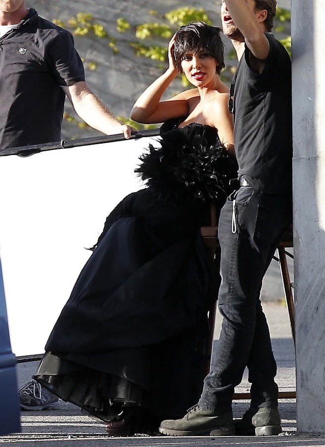 Kim Kardashian posing in a photo shoot with new hair style