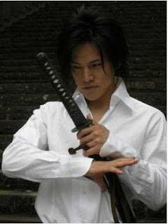 Is that the right way to hold the sword? Is that the right way to hold the sword?