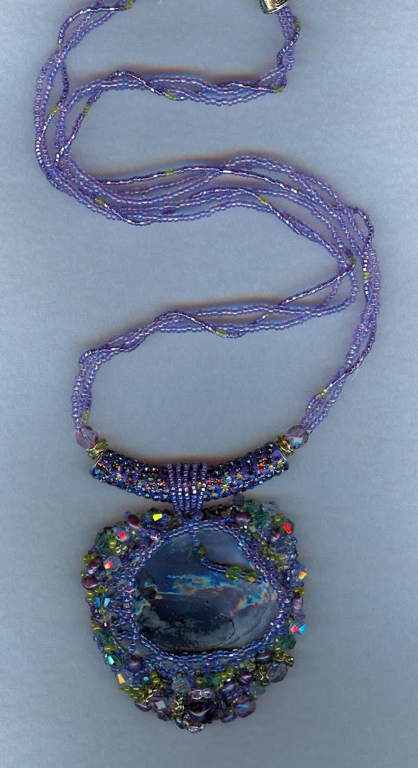 necklace with purple sea shell