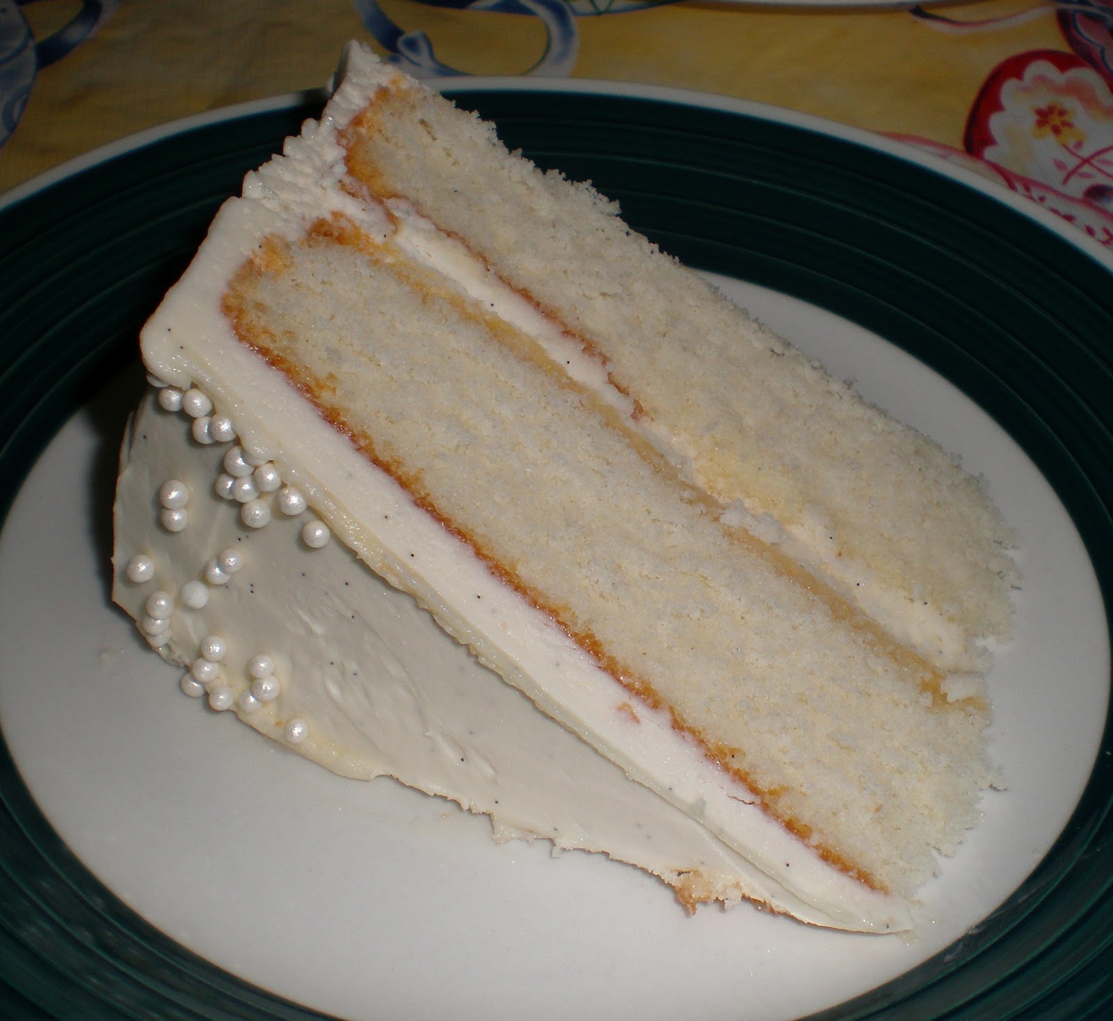 SugarCoated Delights Fluffy Vanilla Cake with Whipped Vanilla Bean Frosting