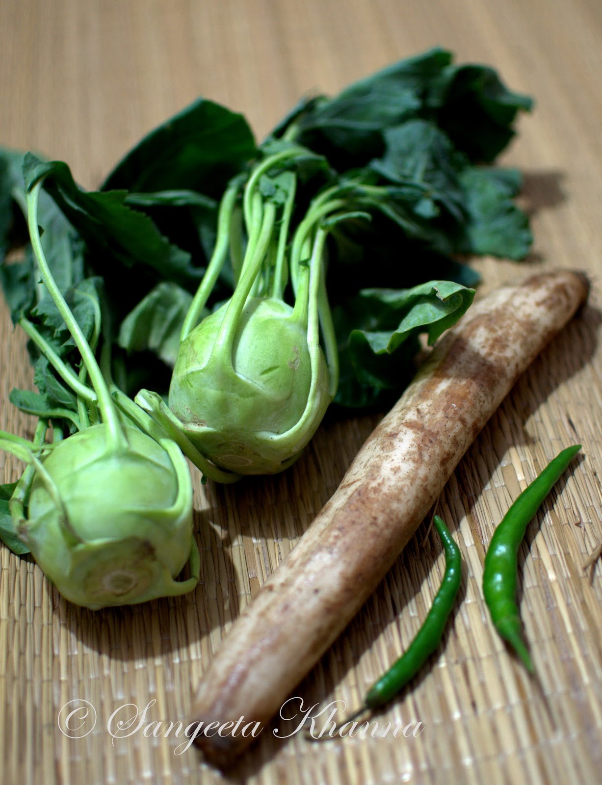 knol khol, kohlrabi or ganth gobi...two soupy Kashmiri style curry with it..