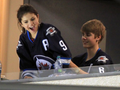 Justin Bieber and Selena Gomez need to get a room selena gomez ass