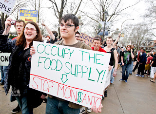 Occupy the Food Supply - Stop Monsanto - Members of Occupy movements in the Midwest protest against Monsanto's agricultural practises - Missouri Botanical Garden - US government lobbying for Monsanto across the globe