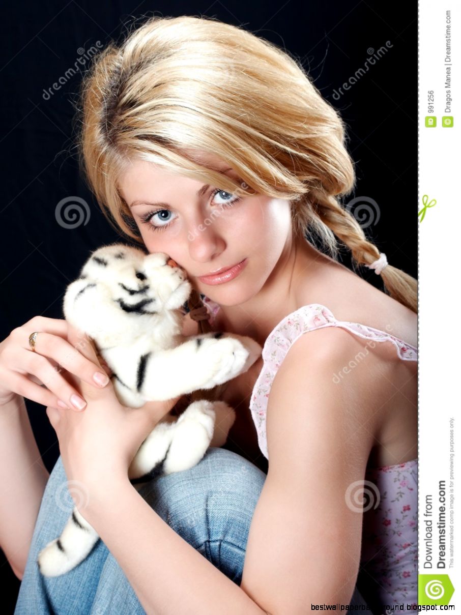 Beautiful Country Girl Holding A Toy Royalty Free Stock Image Beautiful Country Girl Holding A Toy Royalty Free Stock Image
