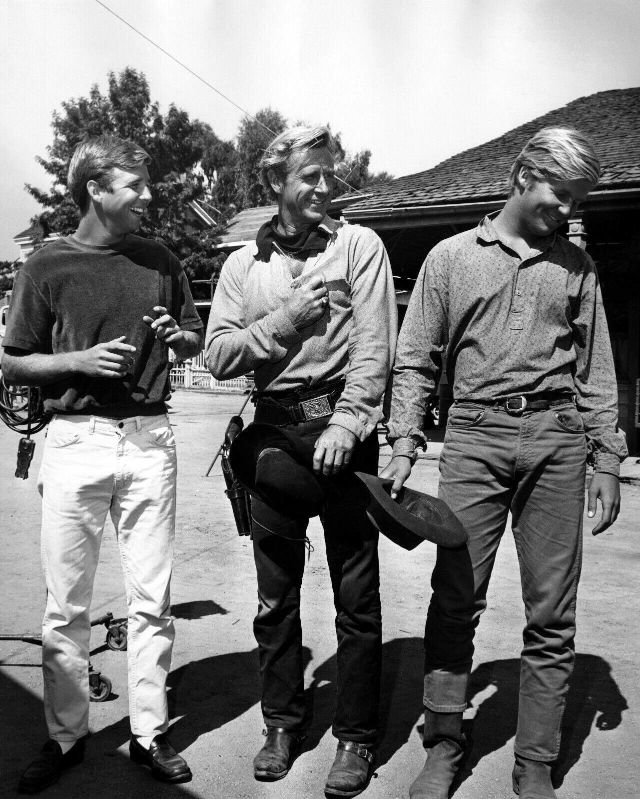 Beau, Lloyd, and Jeff Bridges in the yard of Lloyd's home. c1970s..