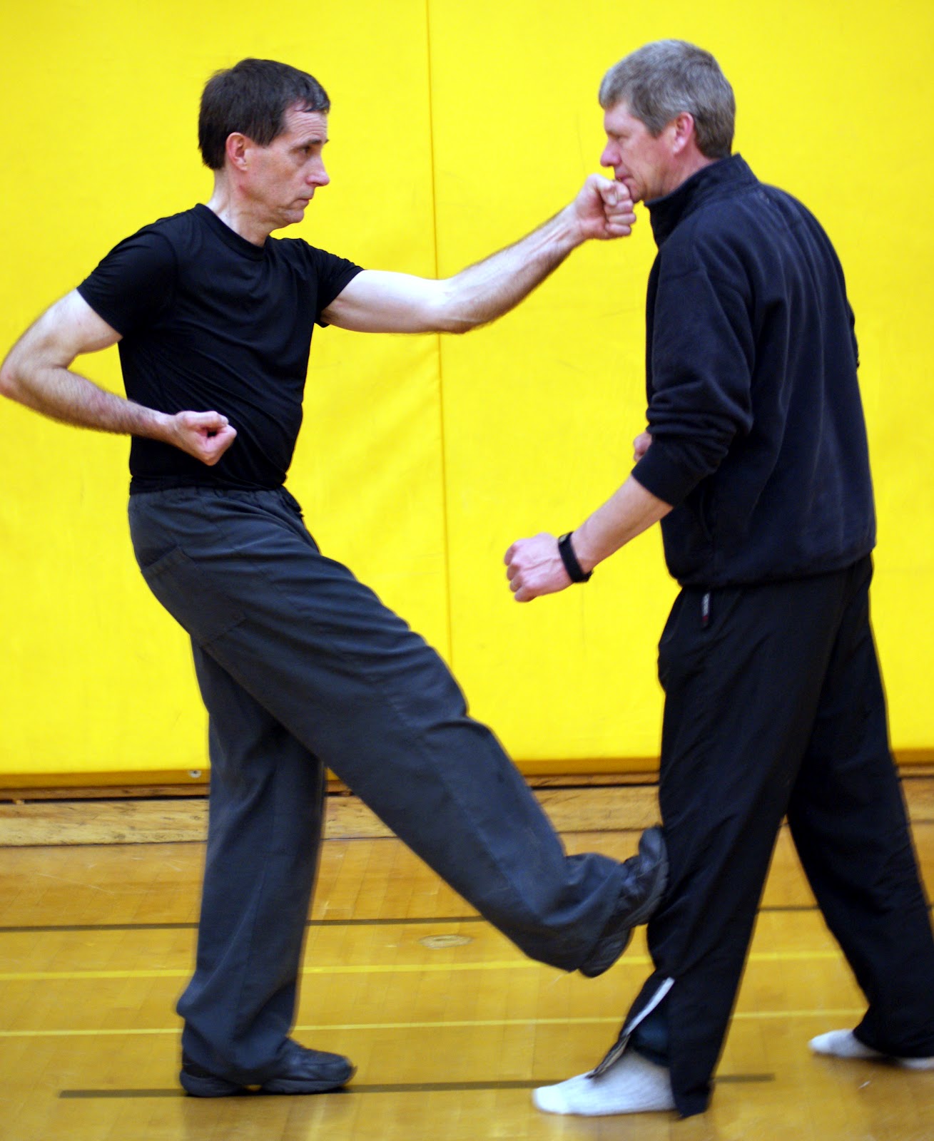 Self Defense Simultaneous Kicking and Punching
