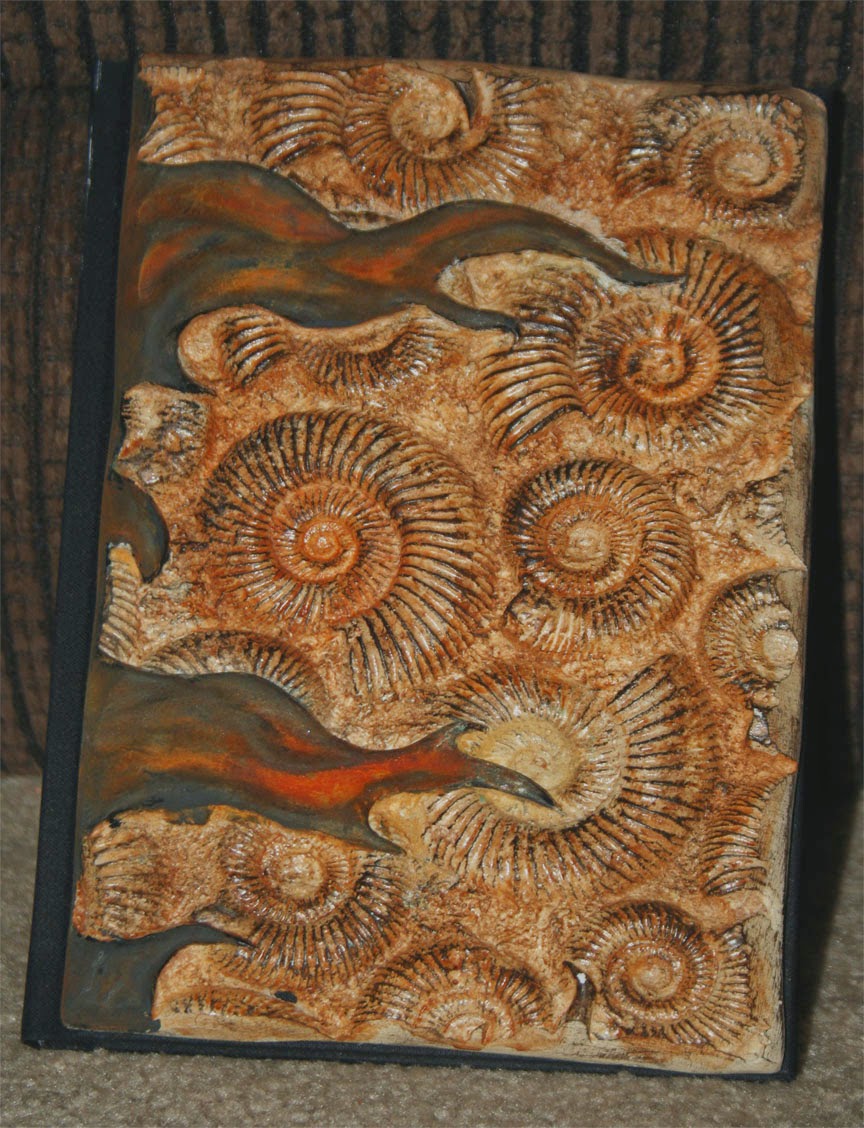 05-Small-Fossil-Notebook-Tim-Baker-Intricately-Designed-Book-Covers-www-designstack-co