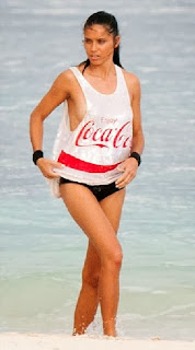 Adriana Lima wears a Black Bikini and Coca Cola at Tulum, Mexico