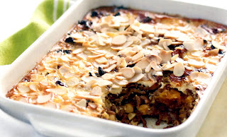Traditional South African bobotie, a baked meatloaf with a custard and flaked almond topping