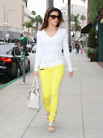 Eva Longoria bright yellow pants and white top