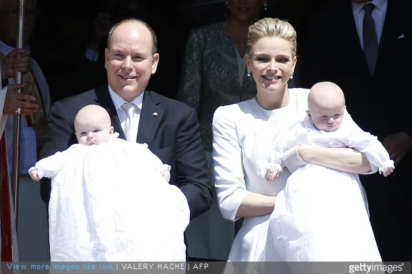 Prince Albert II of Monaco and his wife Princess Charlene pose outside the cathedral after the baptism of their twins Prince Jacques and Princess Gabriella in Monte Carlo, on May 10, 2015.