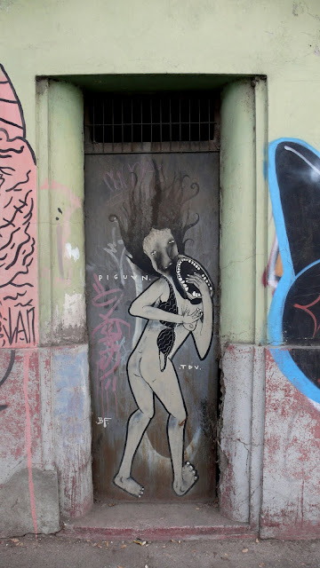 piguan graffiti street art in recoleta, santiago de chile