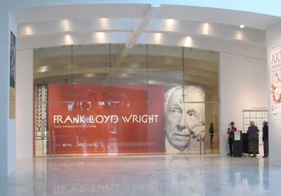 Frank Lloyd Wright's picture across a large white space