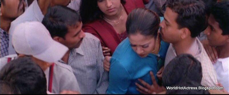 Tamil Actress Jyothika hot boobs press and dress slip.