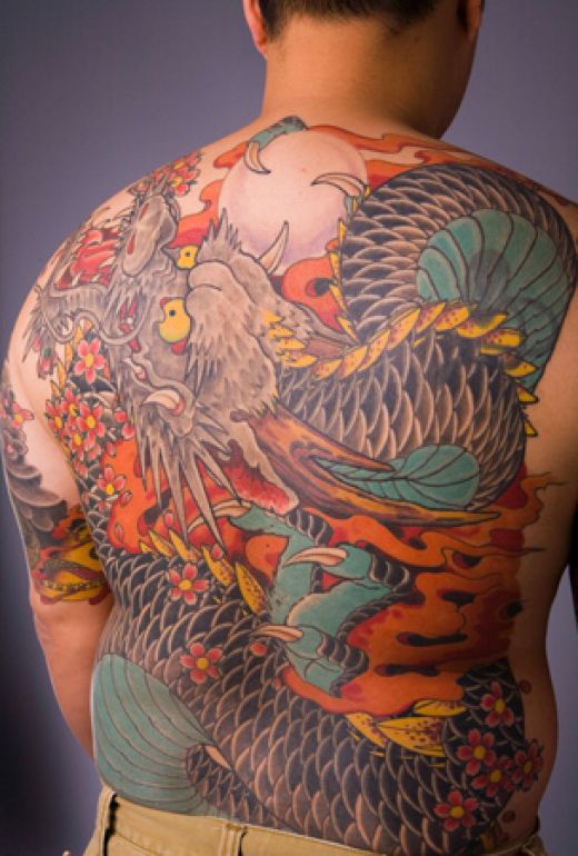 It represents the love I have for tattoos art. Asian style dragon tattoo.