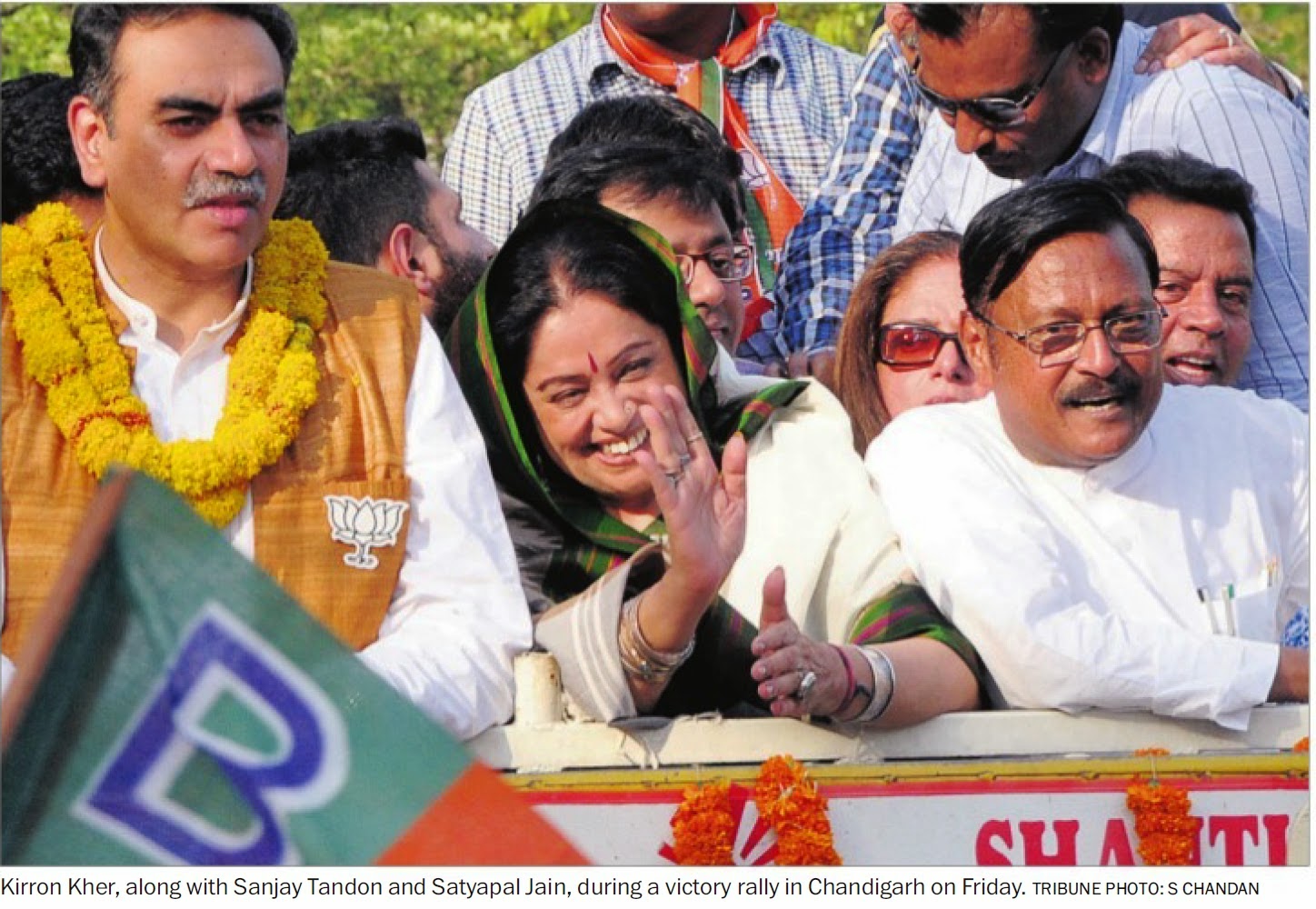 Kirron Kher along with Satya pal Jain, during a victory rally in Chandigarh on Friday