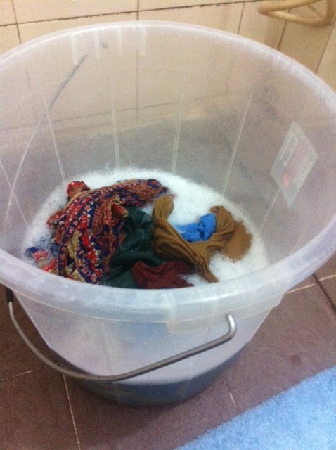 Gaining Perspective: How to wash clothes using only a bucket and soap