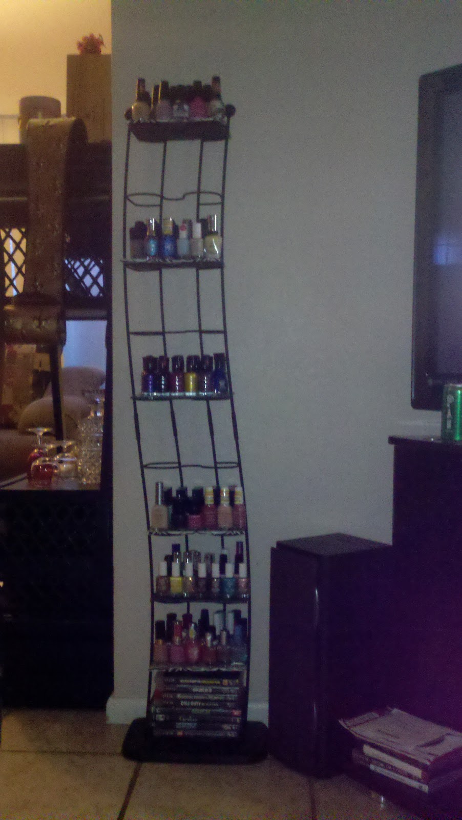 SO, this is my homemade nail polish rack that I made out of my dvd holder!