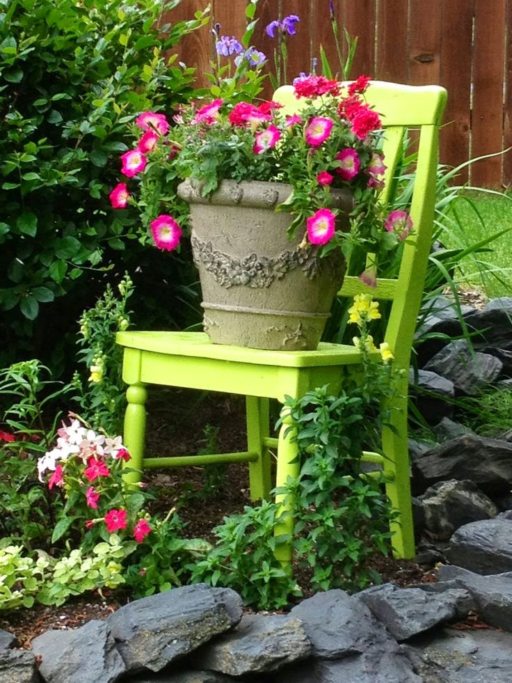 Green Chair In The Garden Gardening In Africa Using Chairs In The Garden