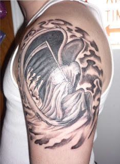 Grim Reaper tattoo / Angel of Death tattoo covering the shoulder and the upper arm