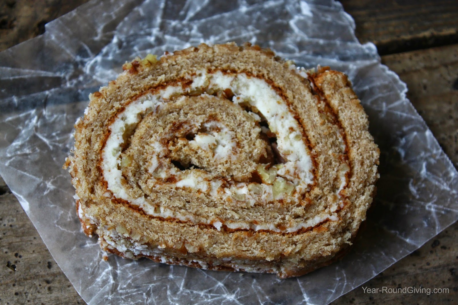 Apple Roll - Apple cake rolled in pecans, coconut and cream cheese.