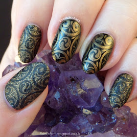 Black gold stamped nail art