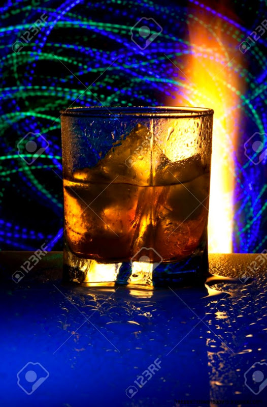 Glass With Against Fire With Reflexion In A Glass Ice Glass With Against Fire With Reflexion In A Glass Ice