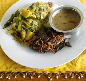 Keralan dishes: aviyal, fried fish, rasam