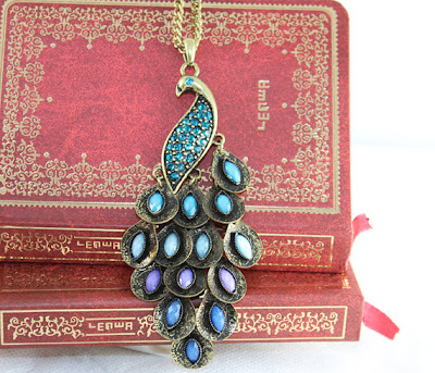 http://www.etsy.com/listing/92669544/blue-precious-stones-peacock-jewelry