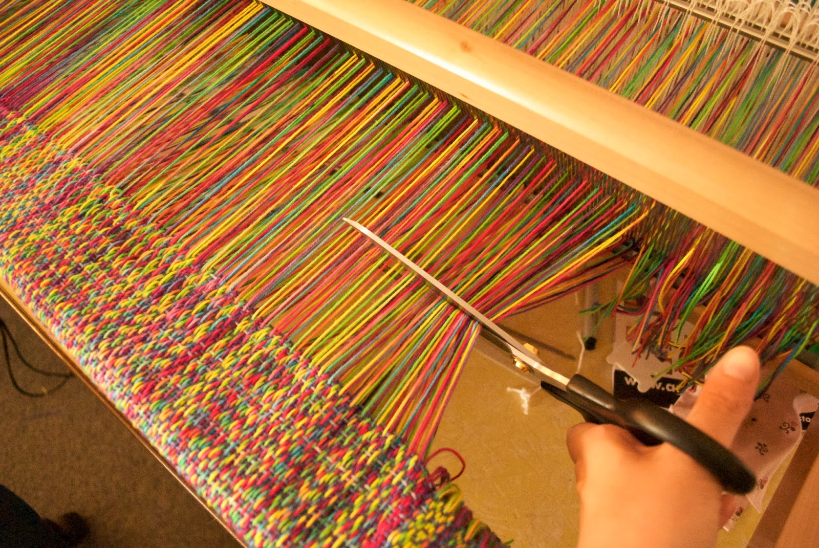 Kelly Casanova Cutting handwoven cloth, one method