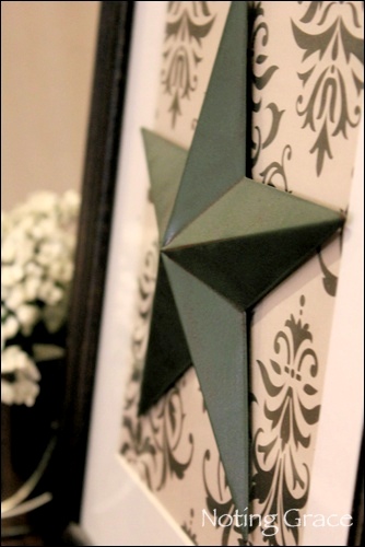 framed scrapbook paper glued star