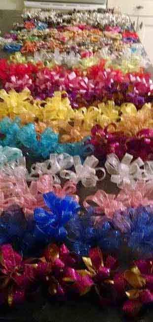 Corsages for a Cause- table full of corsage bases ready for flowers- Given to A Prom to Remember event attendees.  