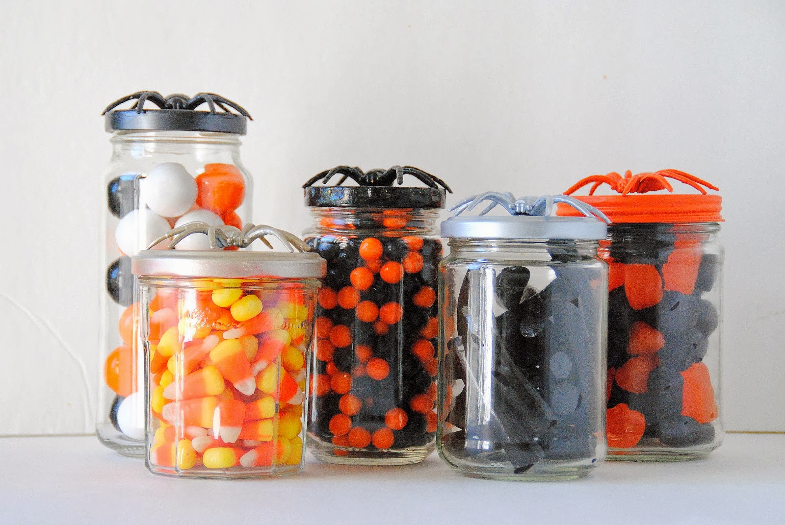 diy spider topped halloween candy jars