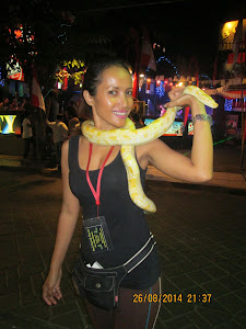 Snake  lady of Legian street.