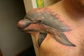 3D DOLPHIN TATTOO ON SHOULDER 