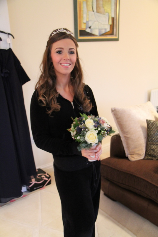 Ashley with her gorgeous wedding bouquet and her equally gorgeous 