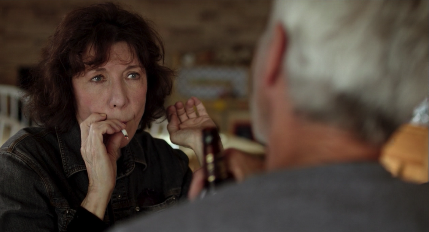 Lily Tomlin smoking a cigarette (or weed)
