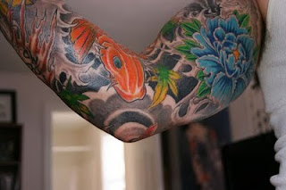 Japanese Koi Fish and Flower Arm Sleeves Tattoo