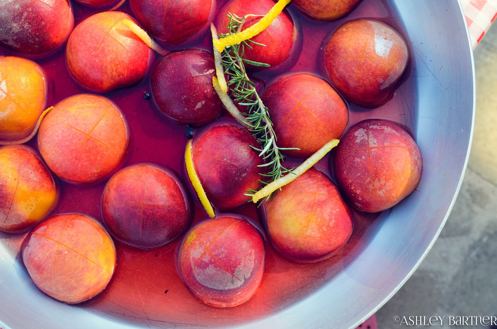 La Tavola Marche Summer Recipe Poached Peaches in White Wine & Rosemary