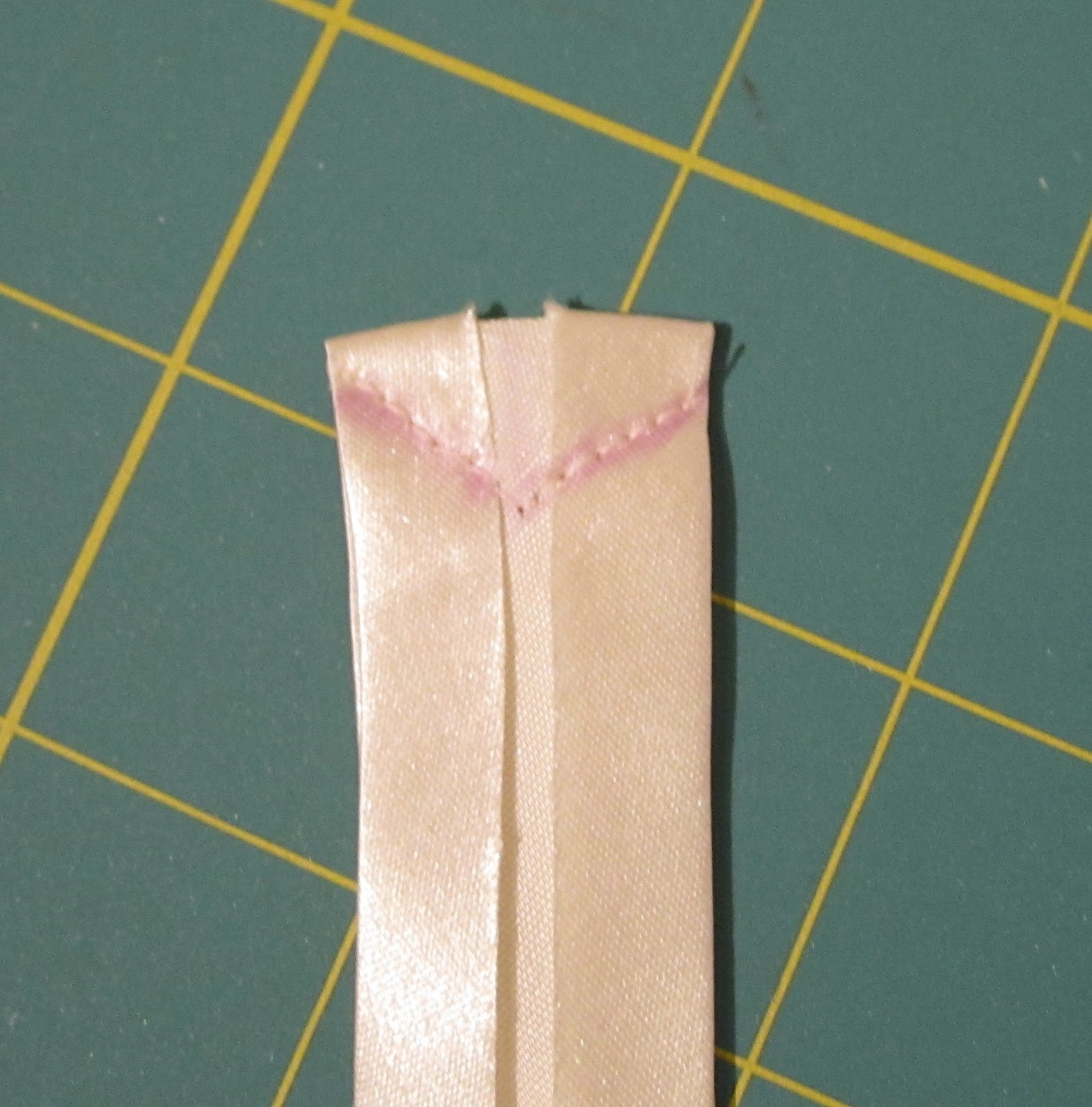 A Few Threads Loose Bias tape binding an inverted corner.