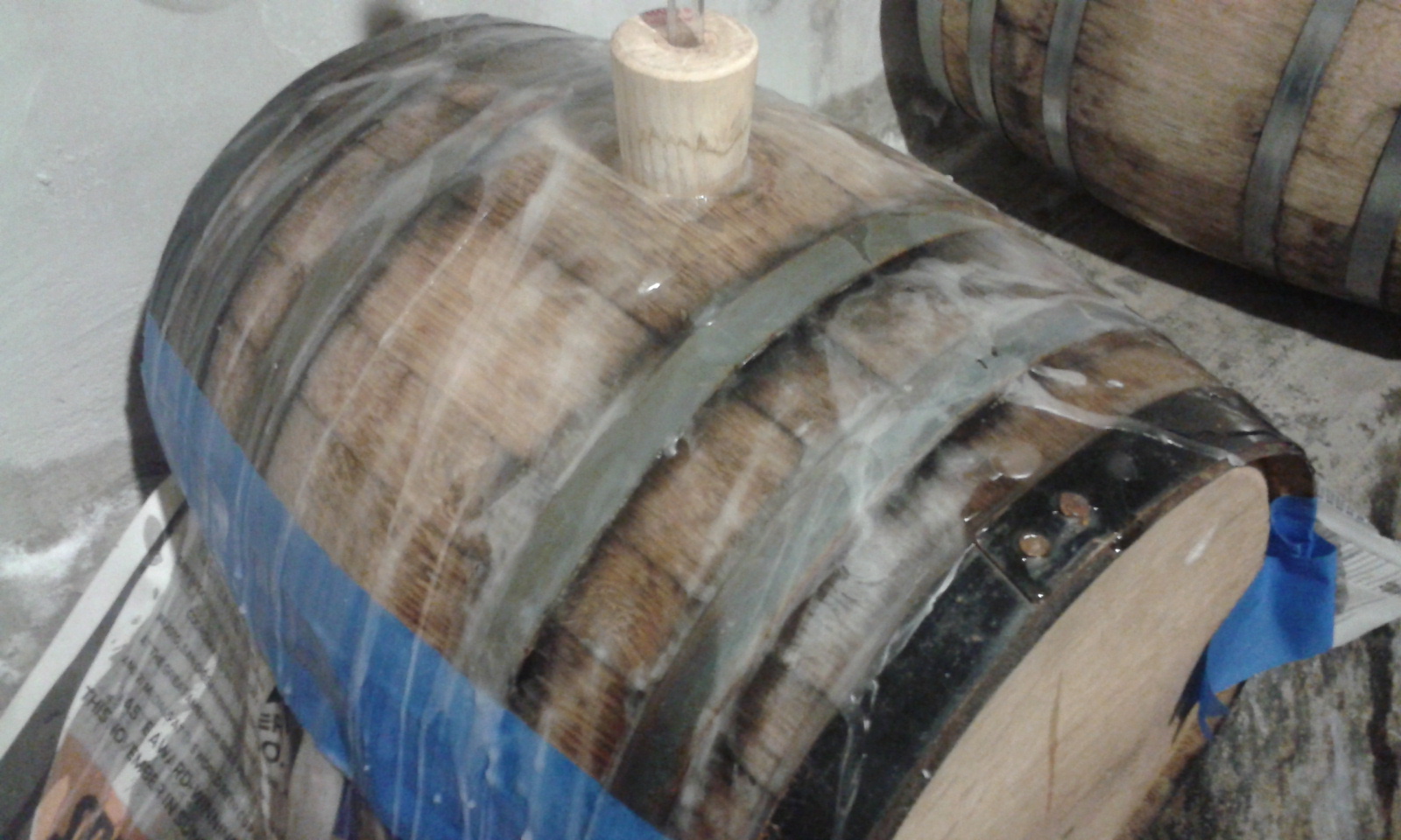 Funk Factory Geuzeria Paraffin waxing a barrel.