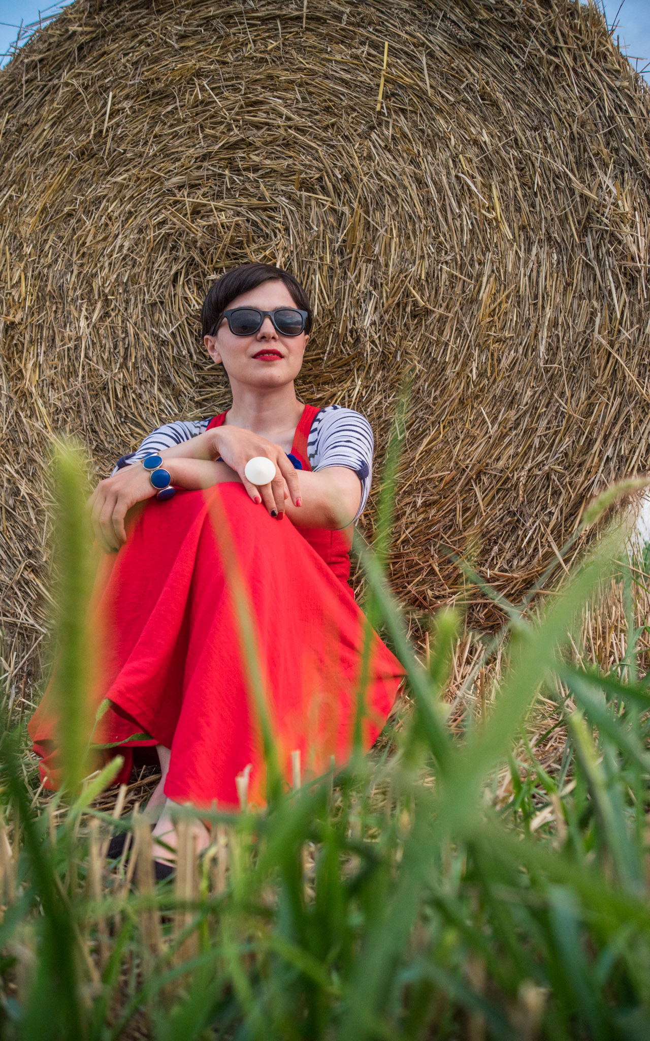 maxi red dress striped top stripes pimkie black flats cardigan hay bales photo shooting  black maxi bag brasov trip mountains 