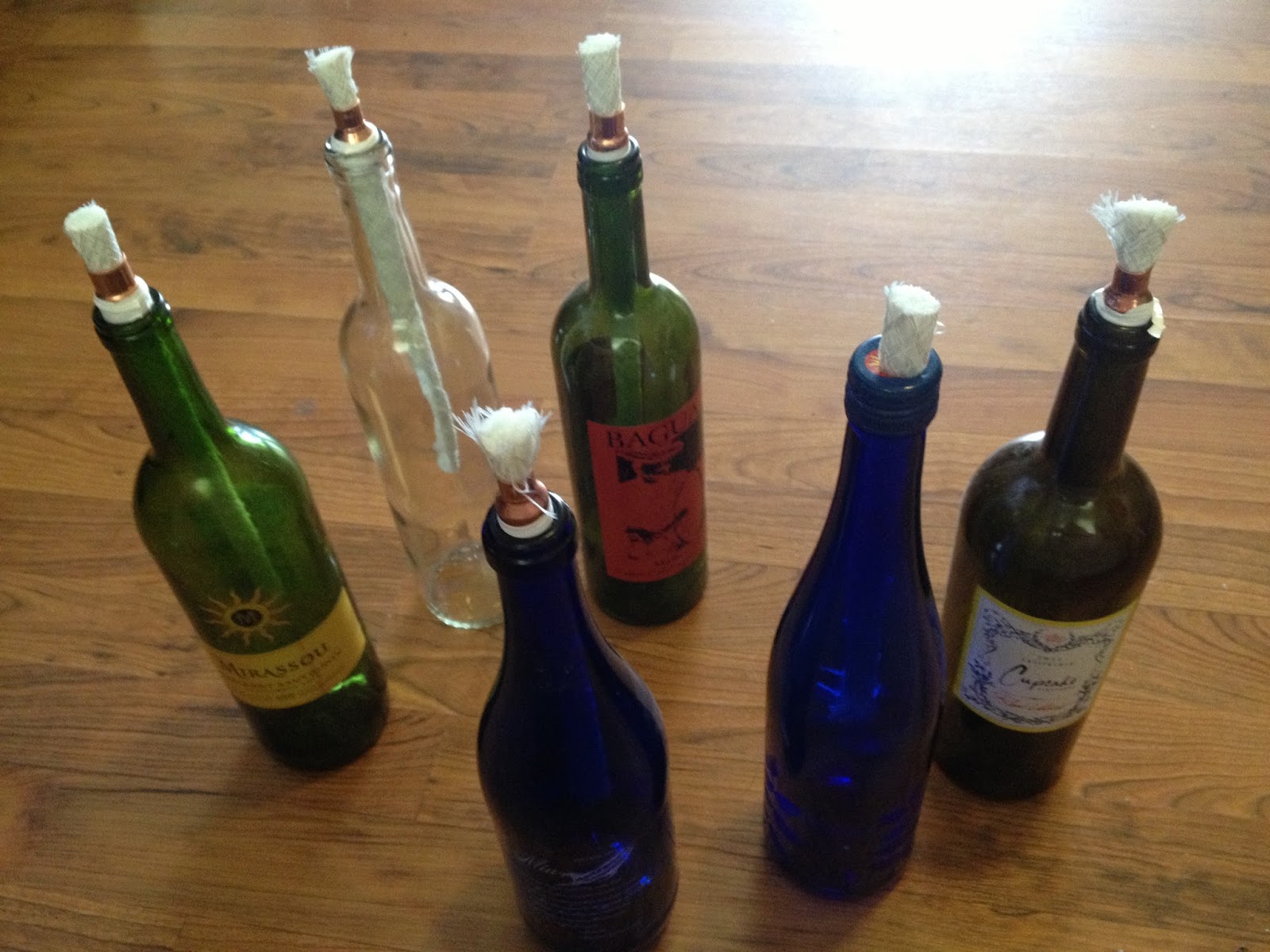 Monday Made It! Citronella Wine Bottle Torches Buzzing with Ms. B