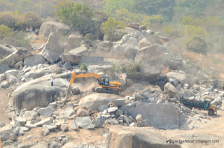 land clearing by earth-moving equipment