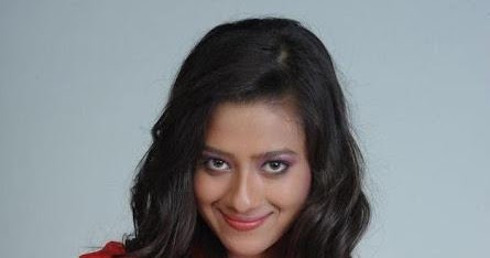 South Spicy Actress Madalasa Sharma Smiling New Mini Skirt Photo Shoot Gallery