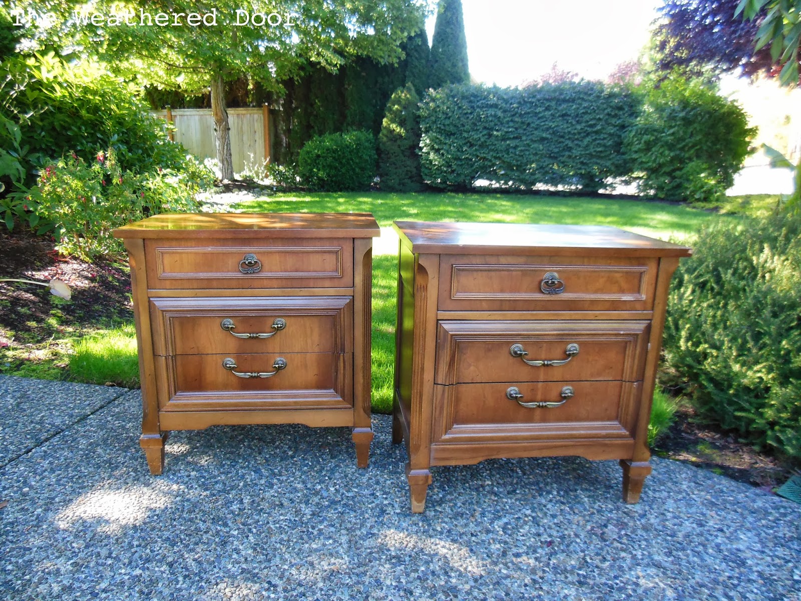 A pair of black nightstands with emerald knobs The Weathered Door