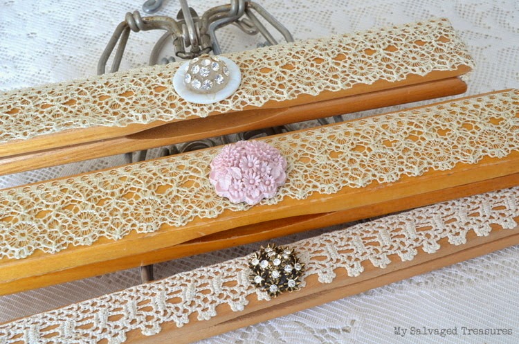 decorated hangers with lace and buttons