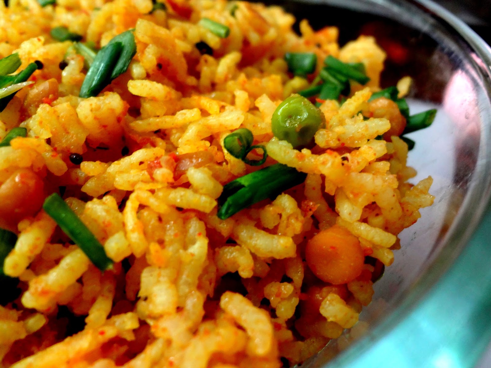 Tomato Rice with spring onions and green peas.