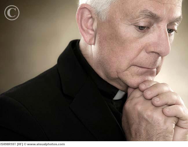 a_priest_praying_is098r18t.jpg